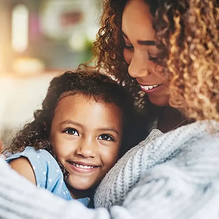 smiling-mom-and-daughter-705x705