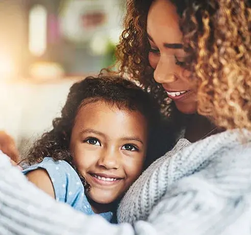 smiling-mom-and-daughter-492x460